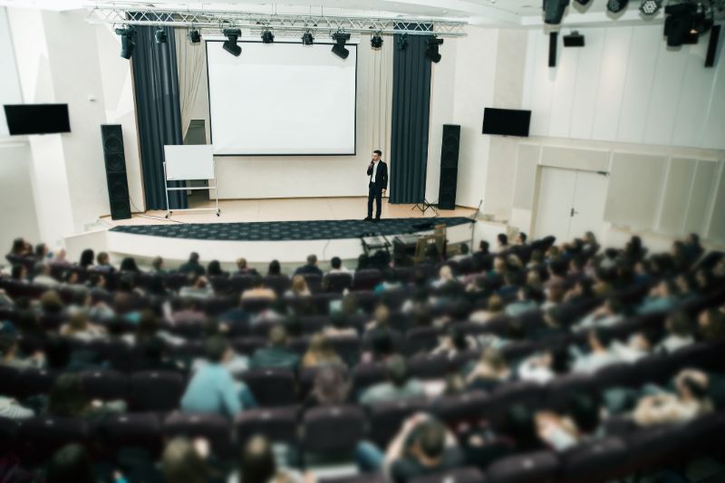 Man giving speech at successful event