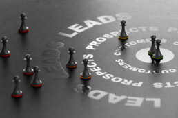 Chess pieces symbolizing strategic planning, representing the integration of lead retrieval into your trade show marketing strategy.