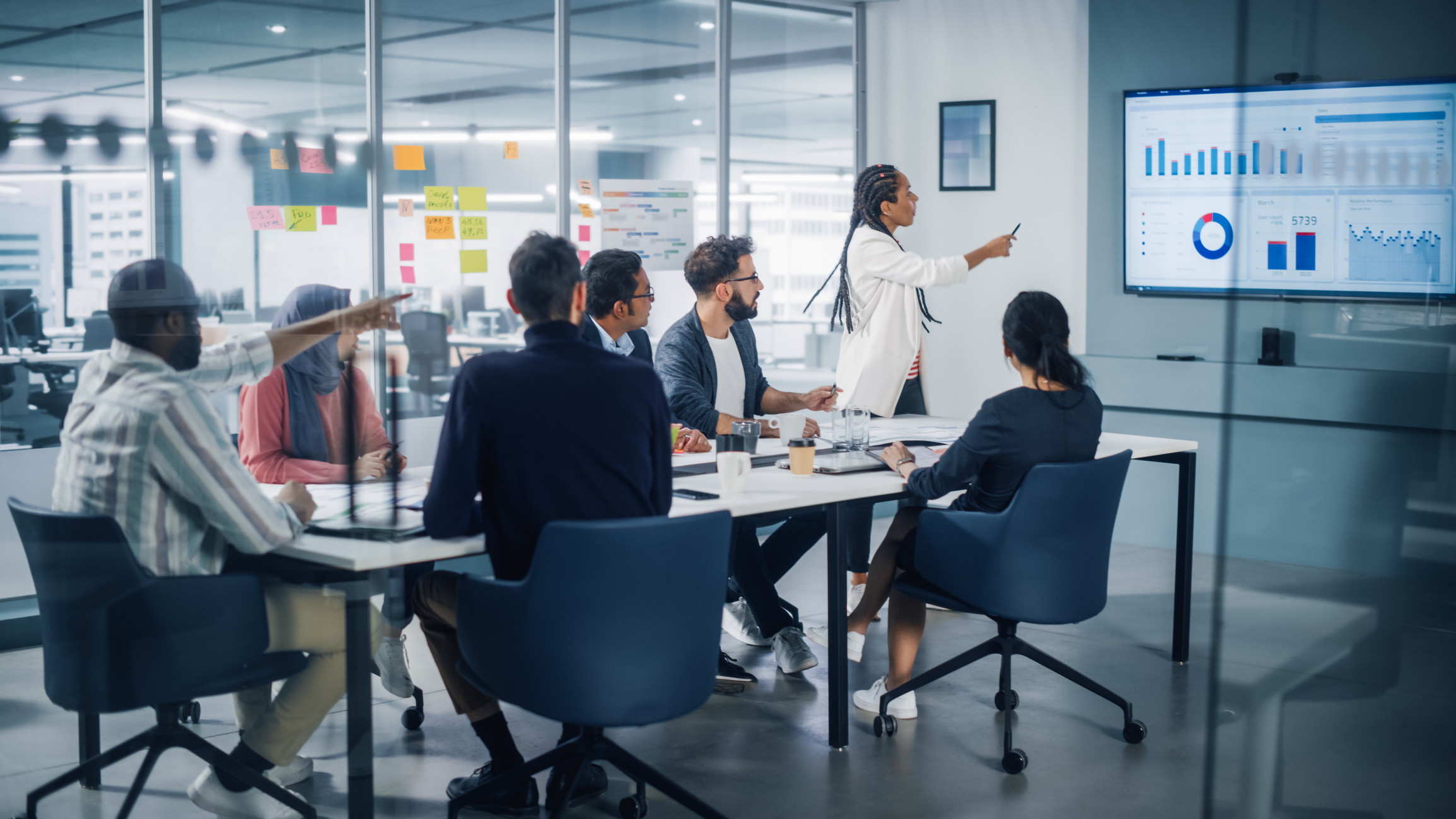 project manager sharing data and openly communicating with team